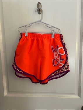 Varsity Brand Bright Orange Women's Athletic Shorts with Purple Trim